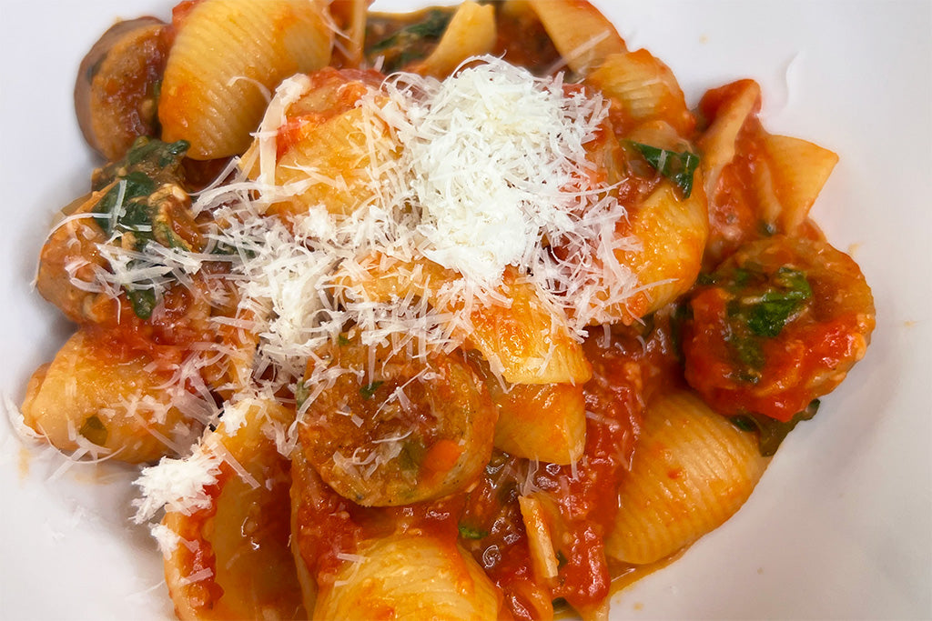 Chicken Sausage Pasta in a white bowl