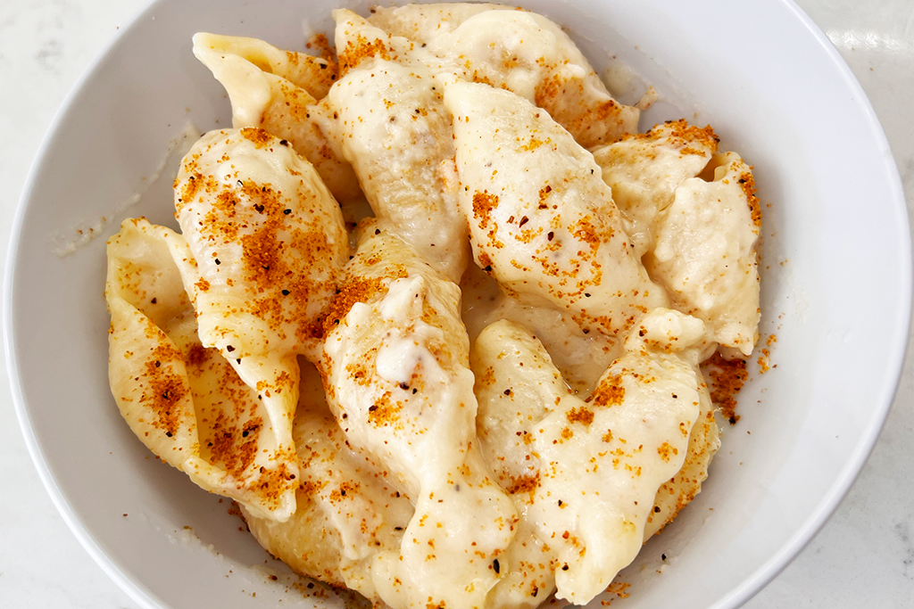 Mac and cheese in a white bowl